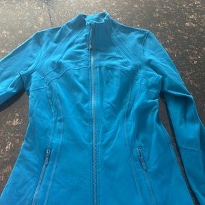 Lululemon zip up. Size 8. Teal in color.